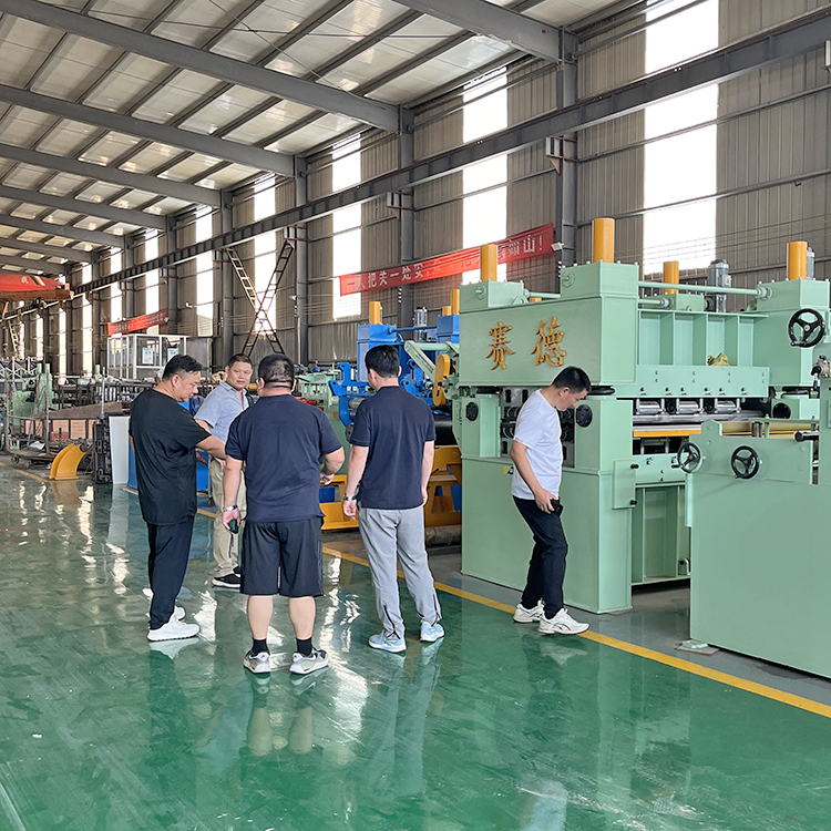 Customer inspects metal coil processing equipment
